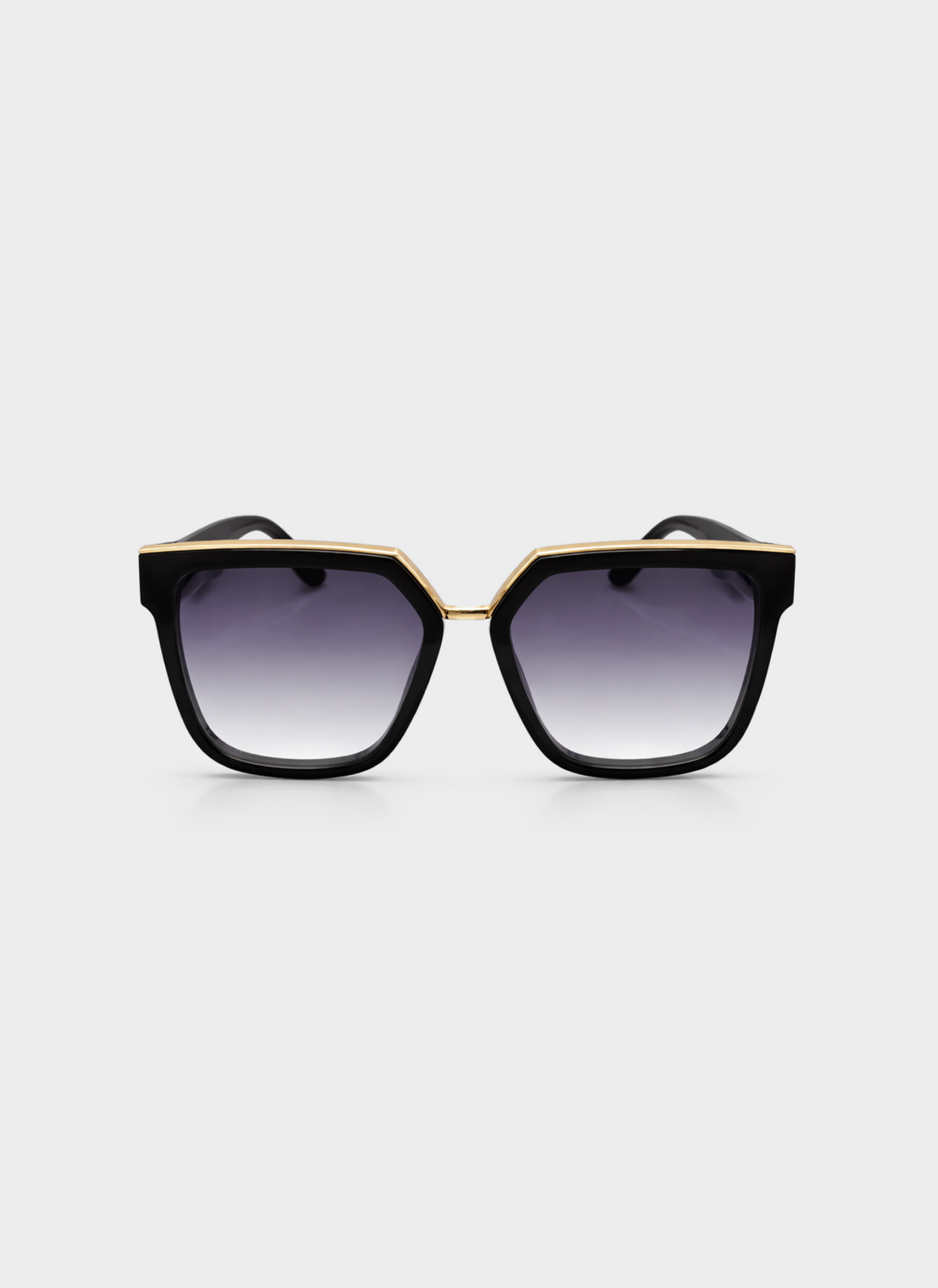 Black sunglasses with gold accents on a white background