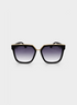 Black sunglasses with gold accents on a white background